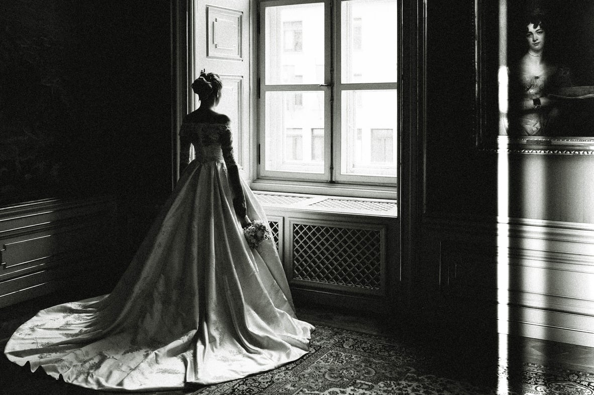 Grayscale Photo of a Woman Wearing Wedding Gown